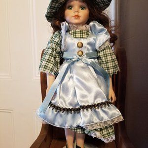 16" tall Porcelain Doll with plaid & blue dress